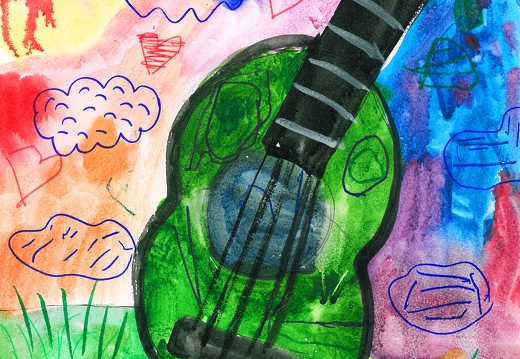 Зелёная гитара на зелёной траве