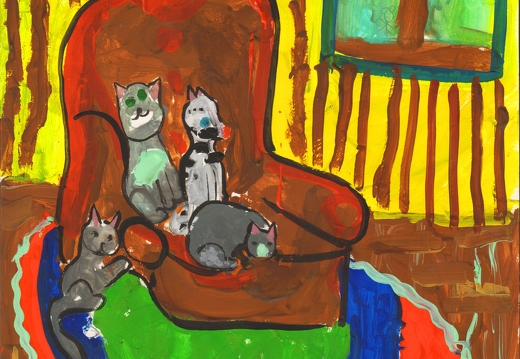 Котики на кресле